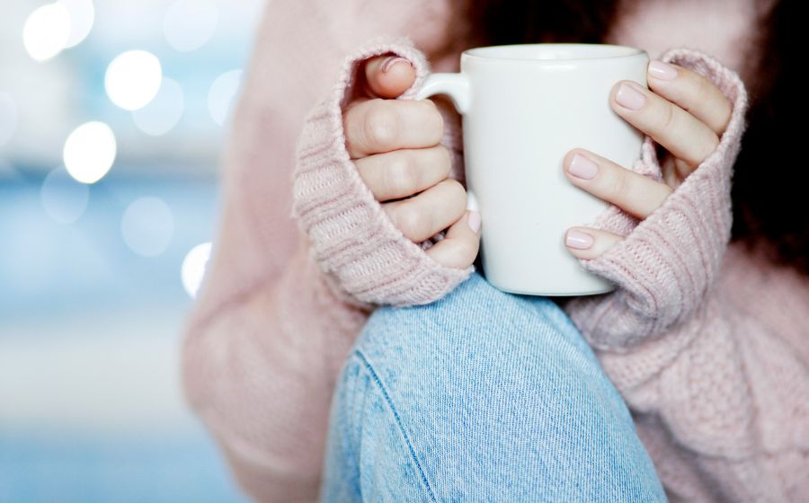 woman holding cup